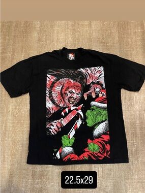 Nickystees terrifier art the clown vs grinch men’s large tee